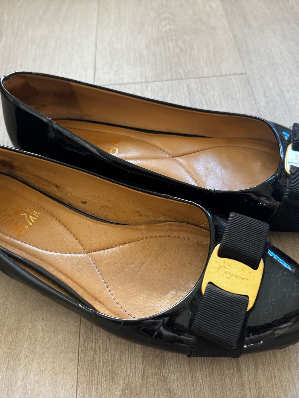 Salvatore Ferragamo Black Patent Leather Vara Bow Flats with Gold Accent